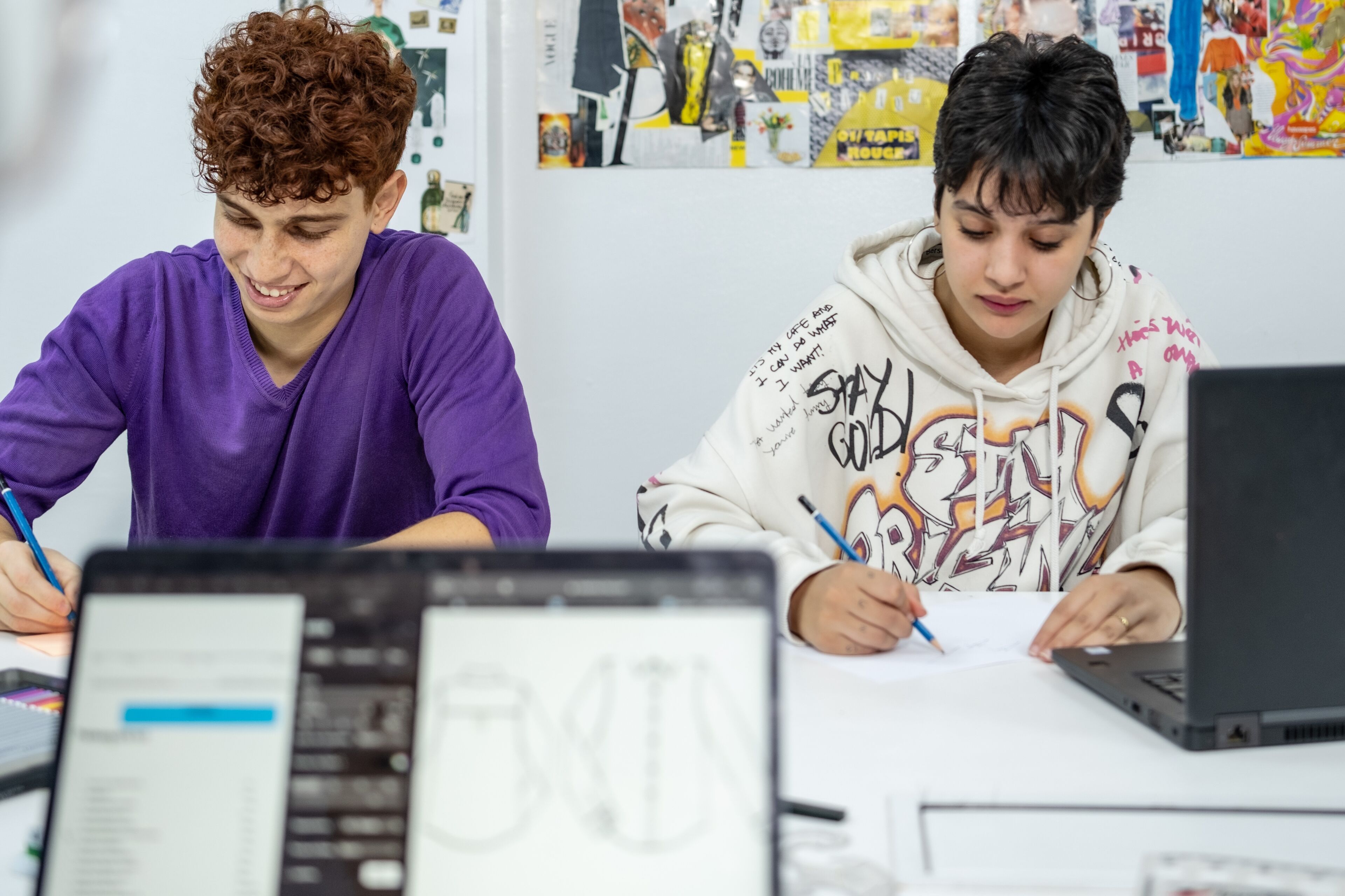 Two Teenagers Studying Together