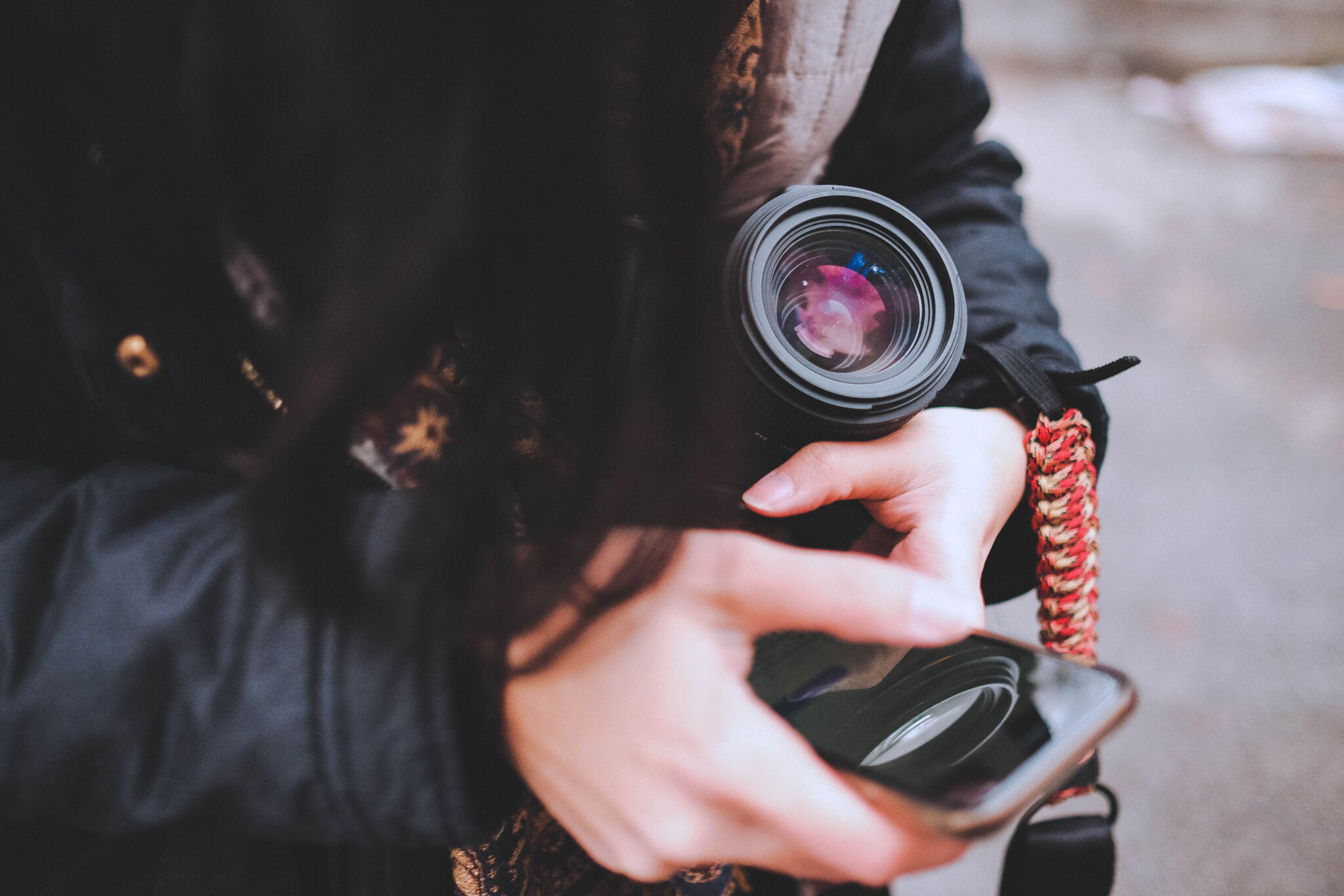 Photographer Checking Smartphone