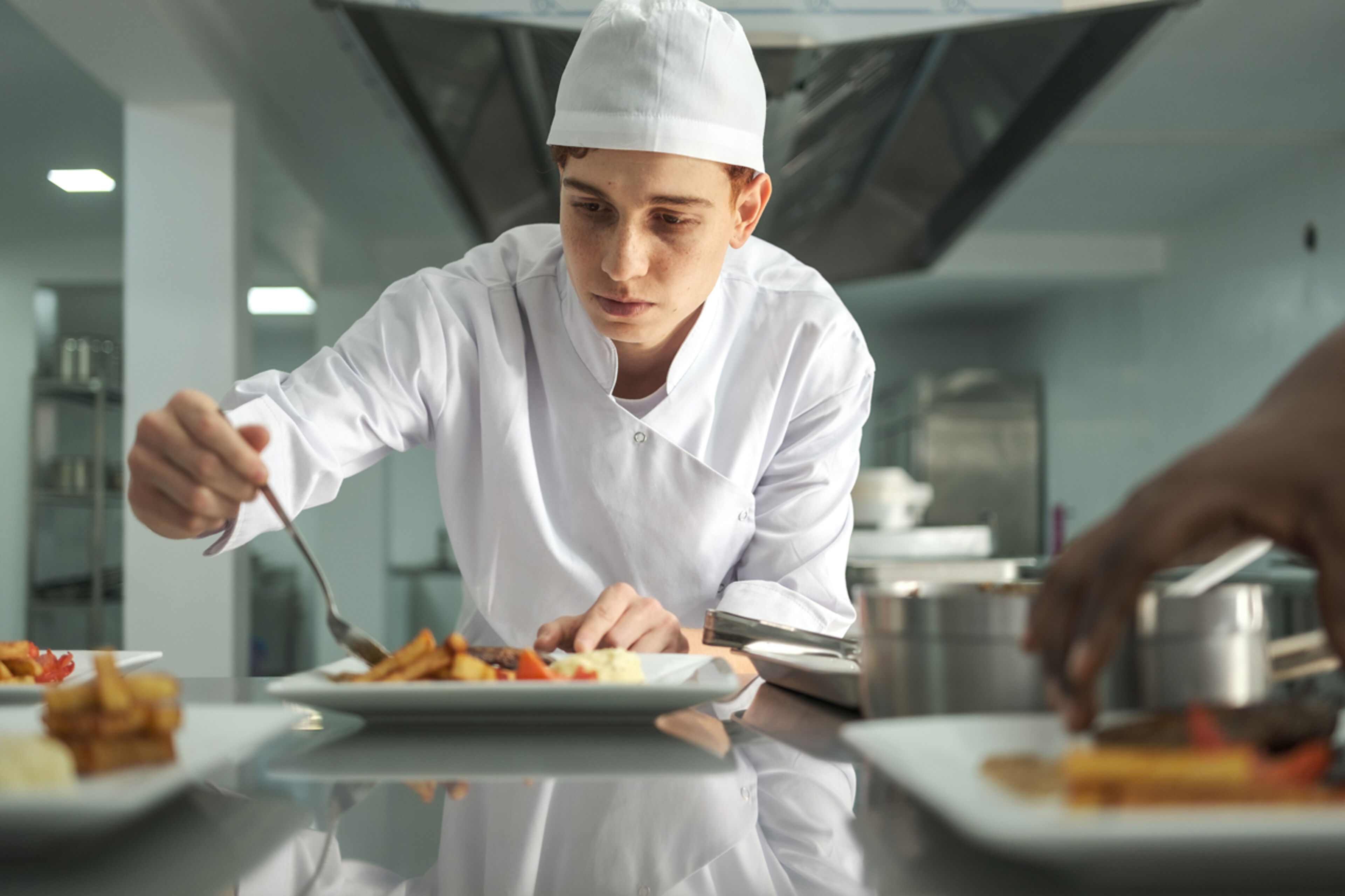 Chef Garnishing a Dish