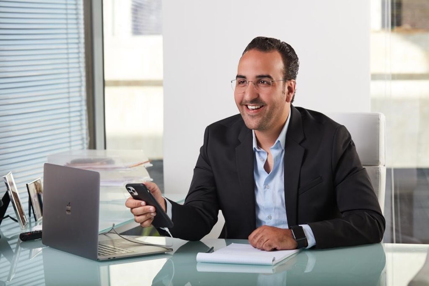 Smiling Businessman in Office