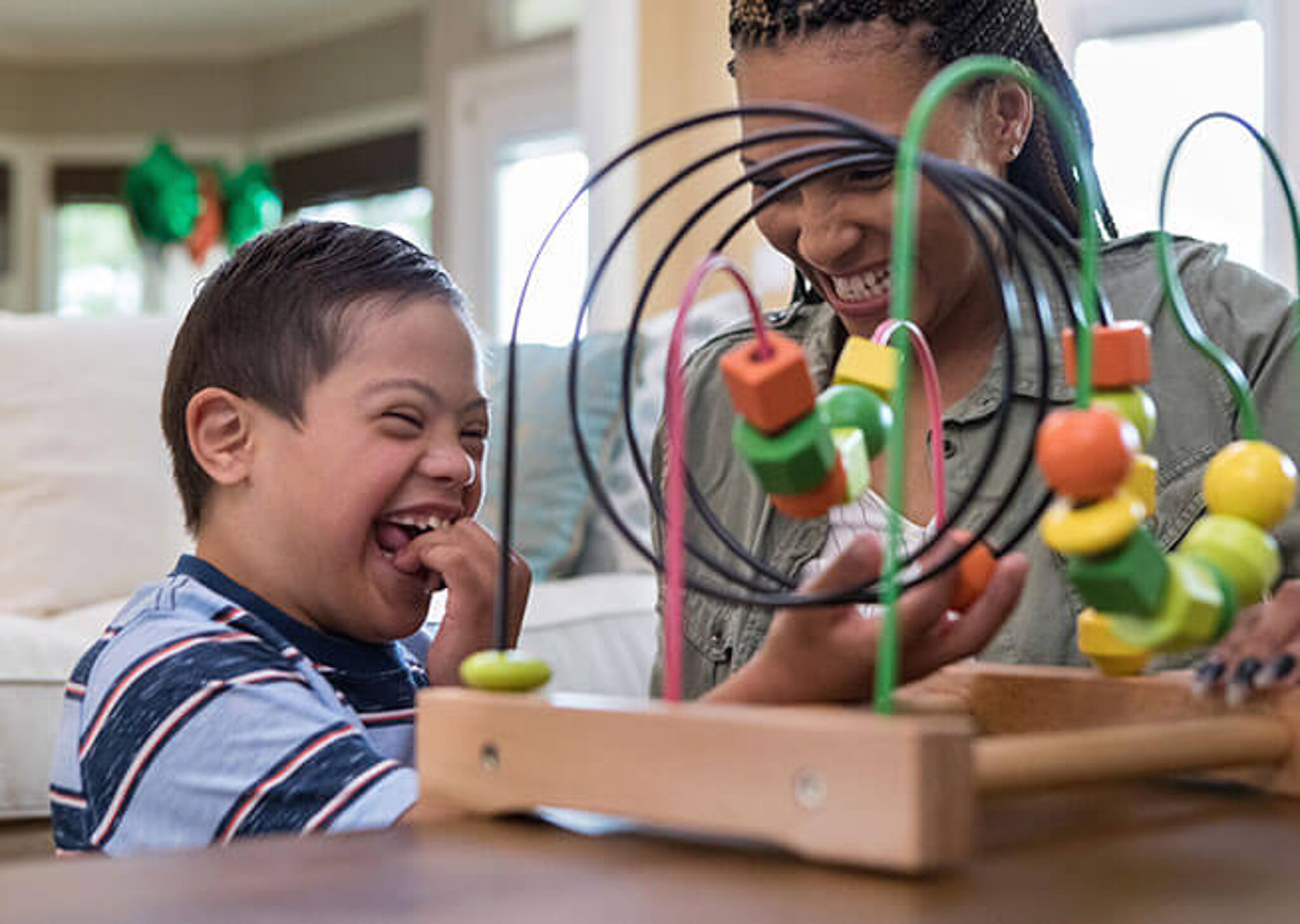 Children's laughter and play during an engaging educational activity.