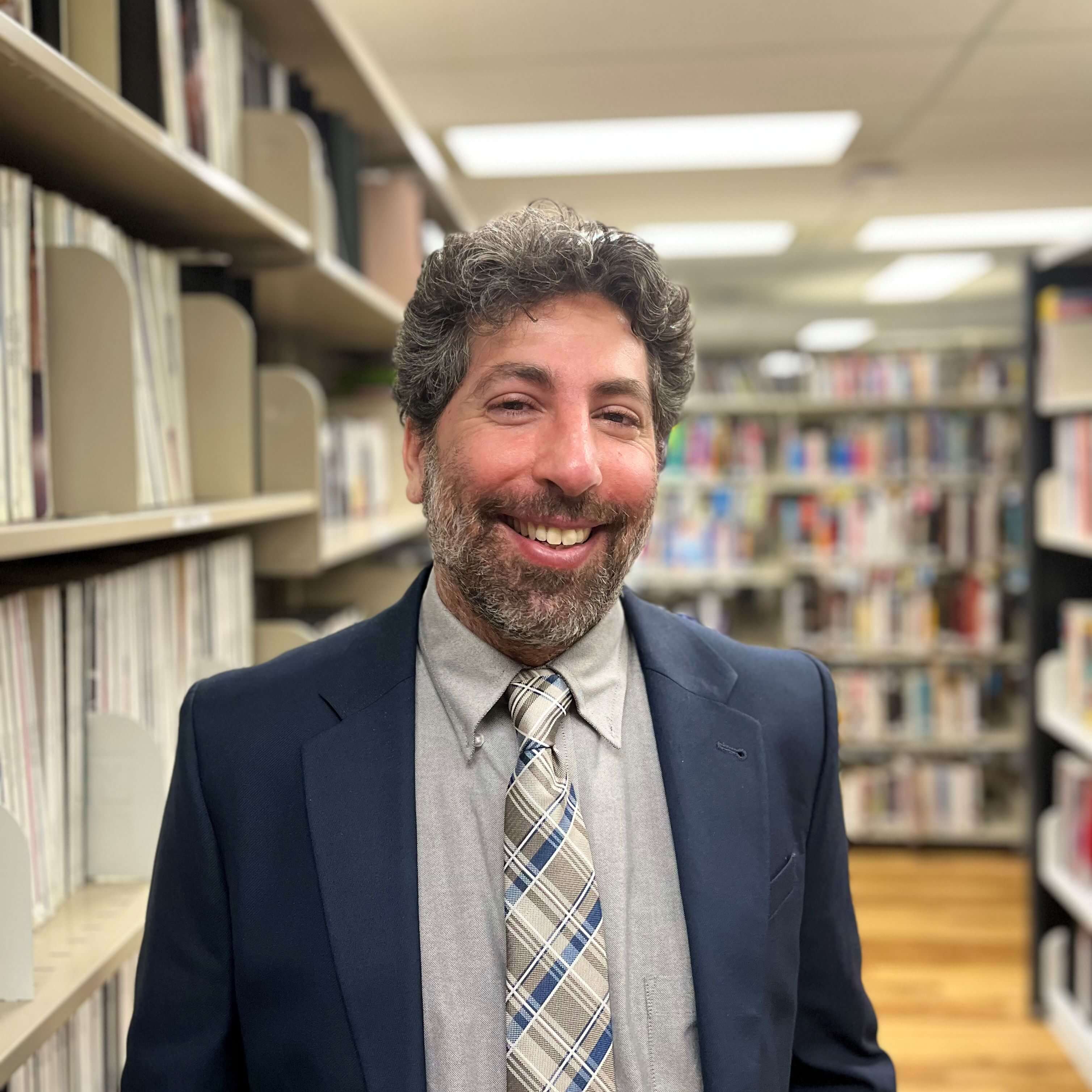 Cheerful Man in Library