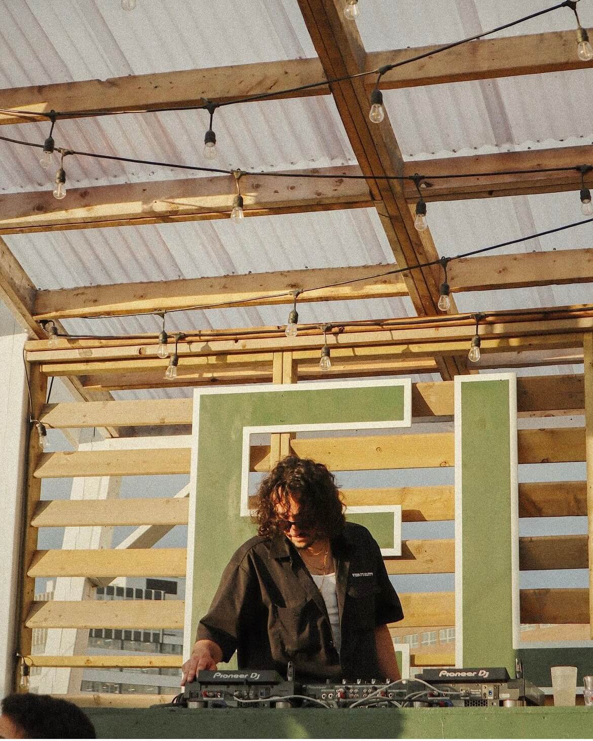 DJ Performing at Sunset DJ Performing at Sunset