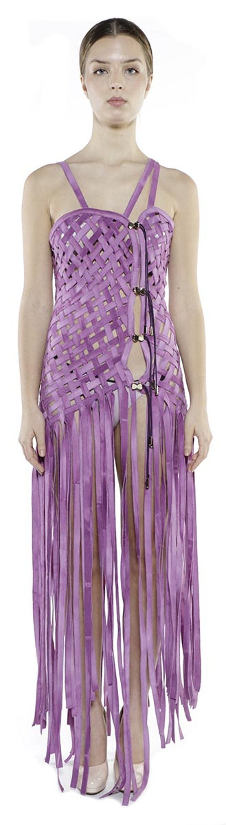 A model wears a long, purple, fringed dress with a woven bodice.