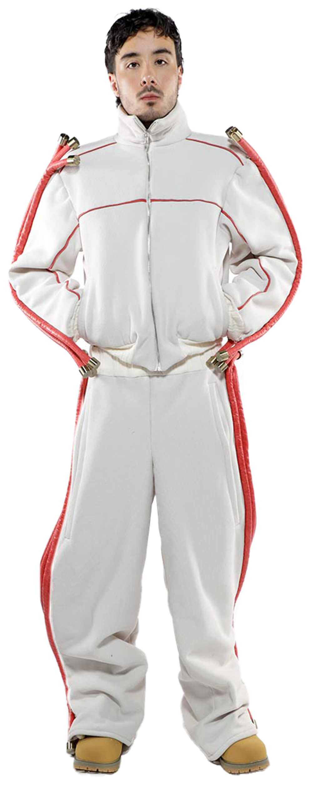 A full shot of a man in a white tracksuit with red accents on the sleeves and legs, standing against a white background.