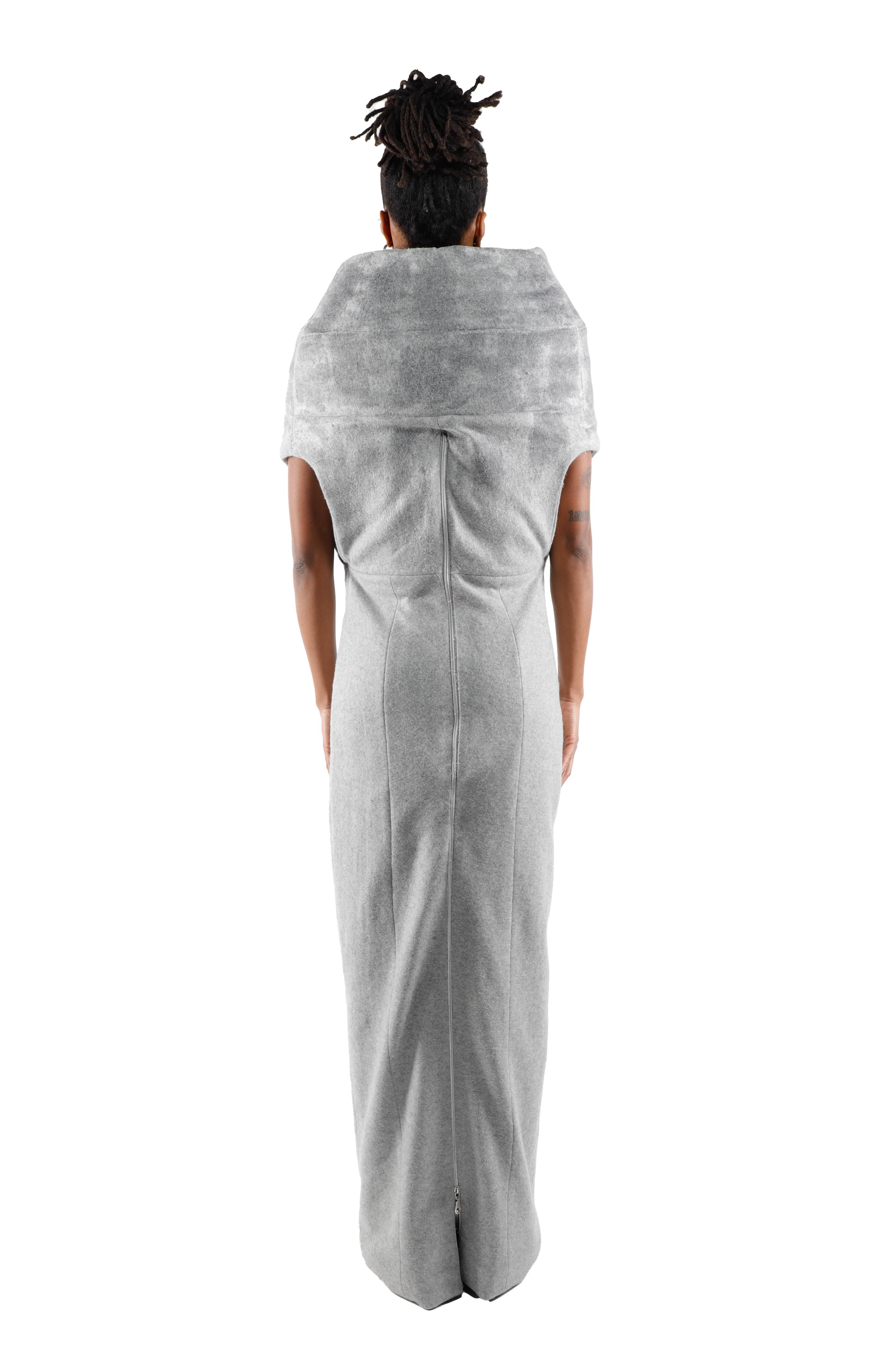 This long grey dress features a cowl neck, short sleeves, and a matching stole, creating an elegant and sophisticated silhouette perfect for formal occasions.