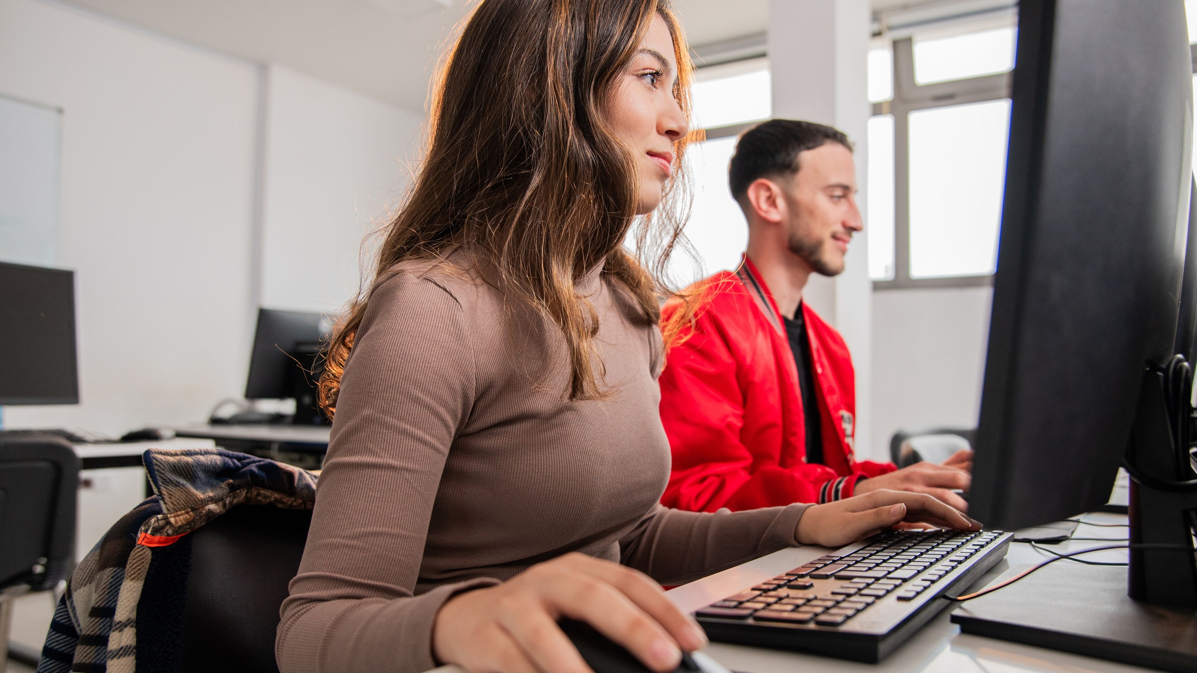 Office Colleagues Working at Desks