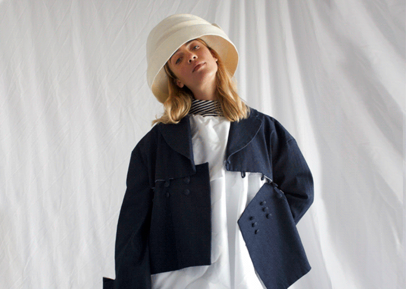 First image displays three individuals in masks and eclectic attire in a dramatic pose, evoking mystery. Second image is of a person in a modern outfit with a white hat, showcasing a casual, chic style.