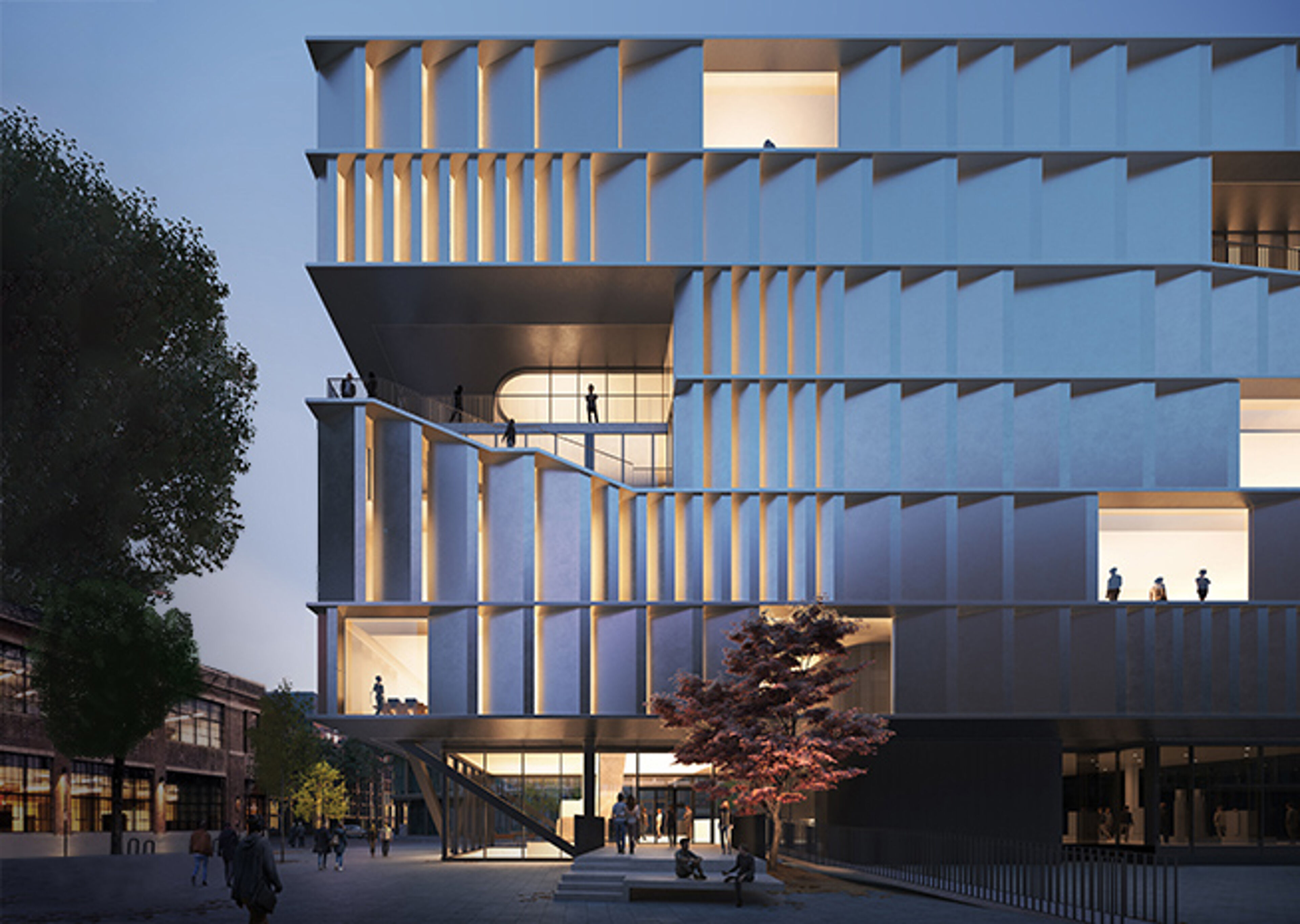 he image captures a contemporary building at dusk, its geometric facade illuminated, highlighting the interplay of light and shadow.