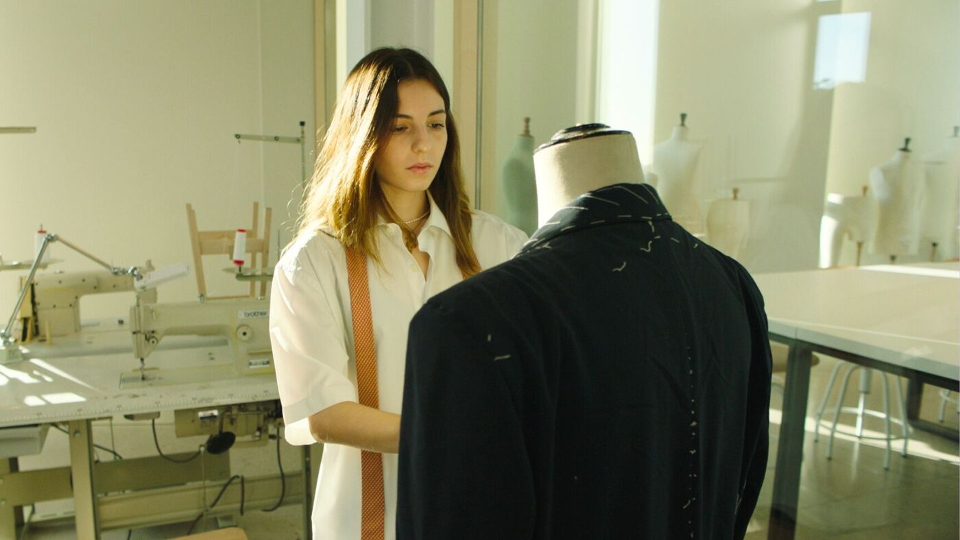 Fashion Student Working on Garment Design