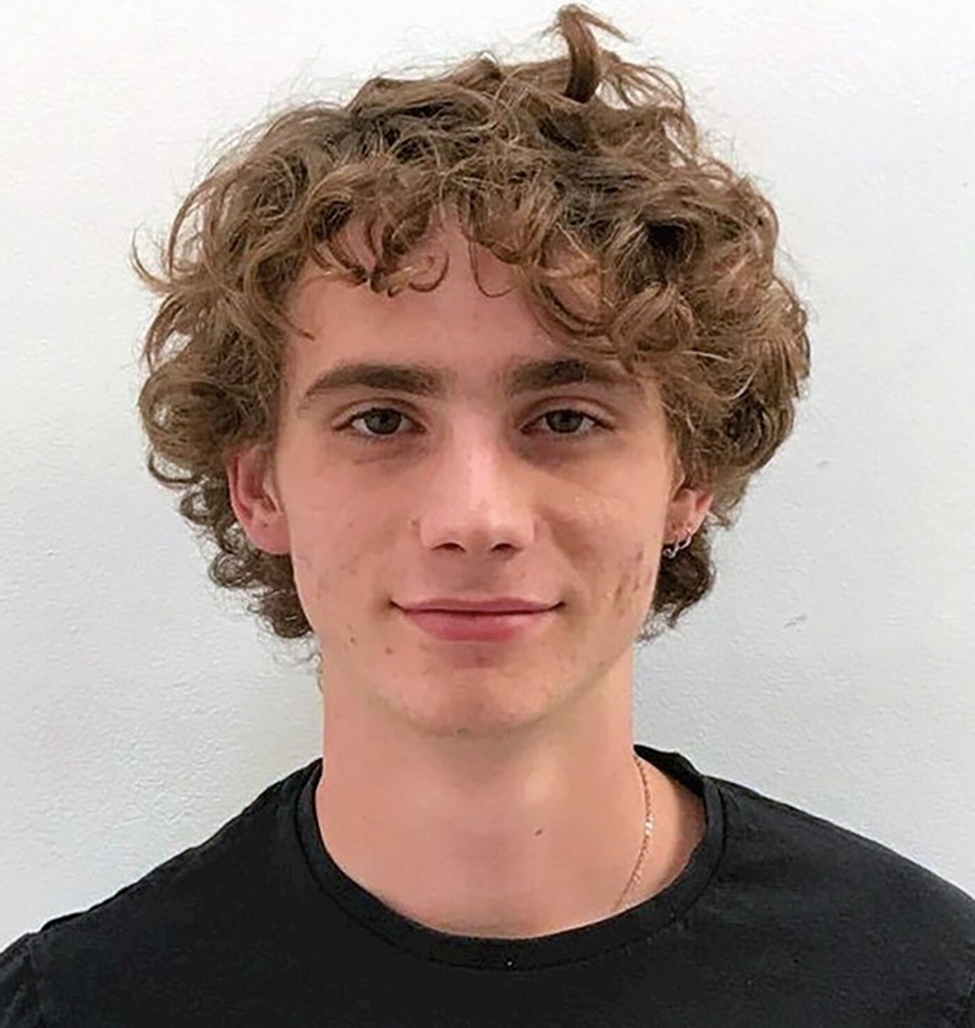 Young Man with Curly Hair