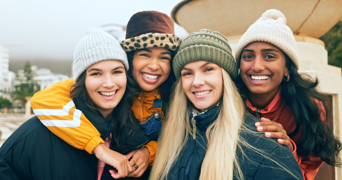 Happy, women and portrait of friends in the city on a vacation, adventure or journey in Canada. Happiness, travel and young female group with a smile having fun on a tour of a urban town in Montreal.