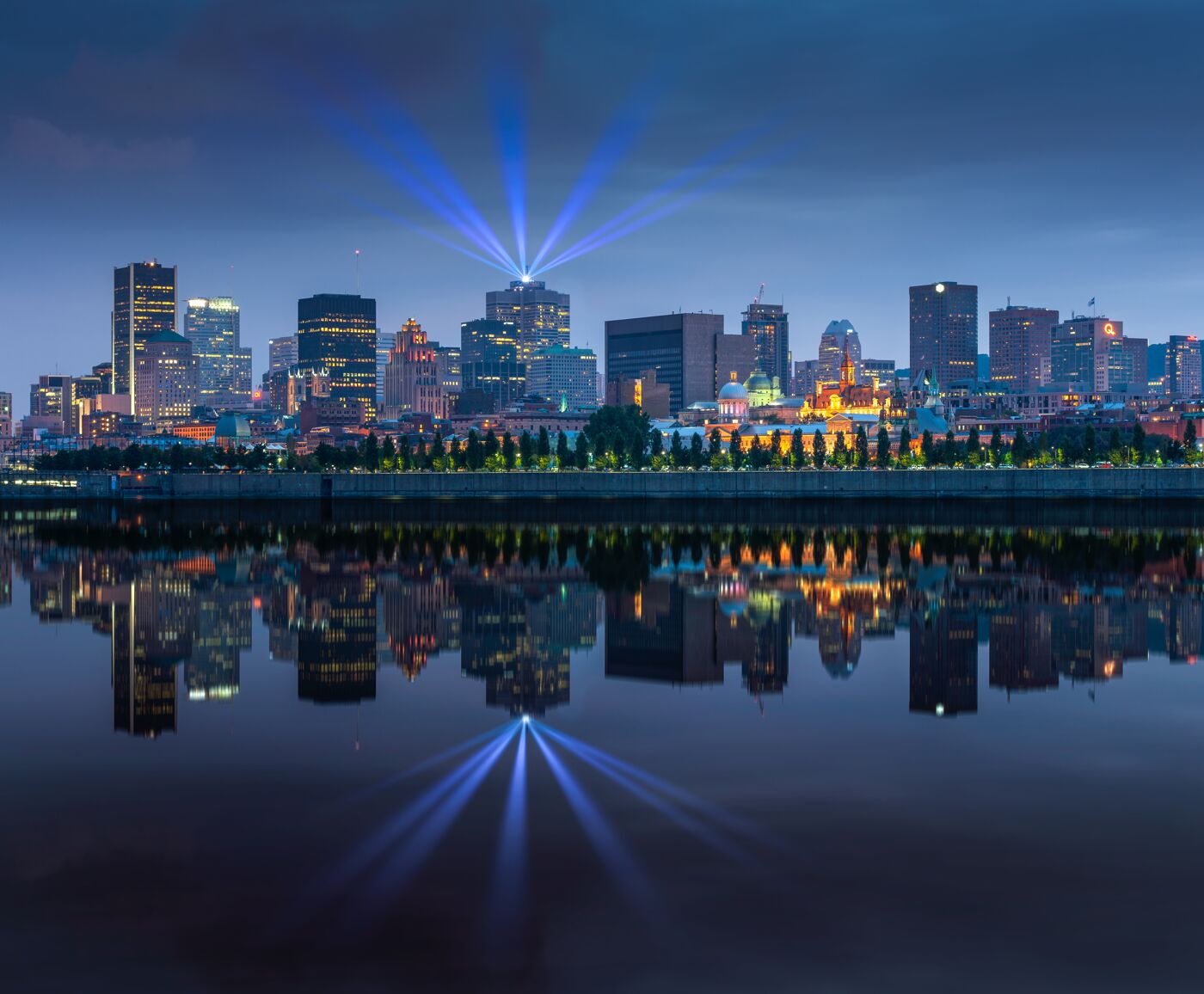 Illuminated Skyline Reflection at Twilight