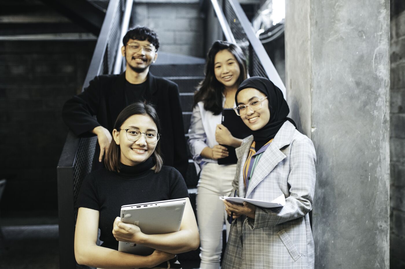 Students talking on campus steps