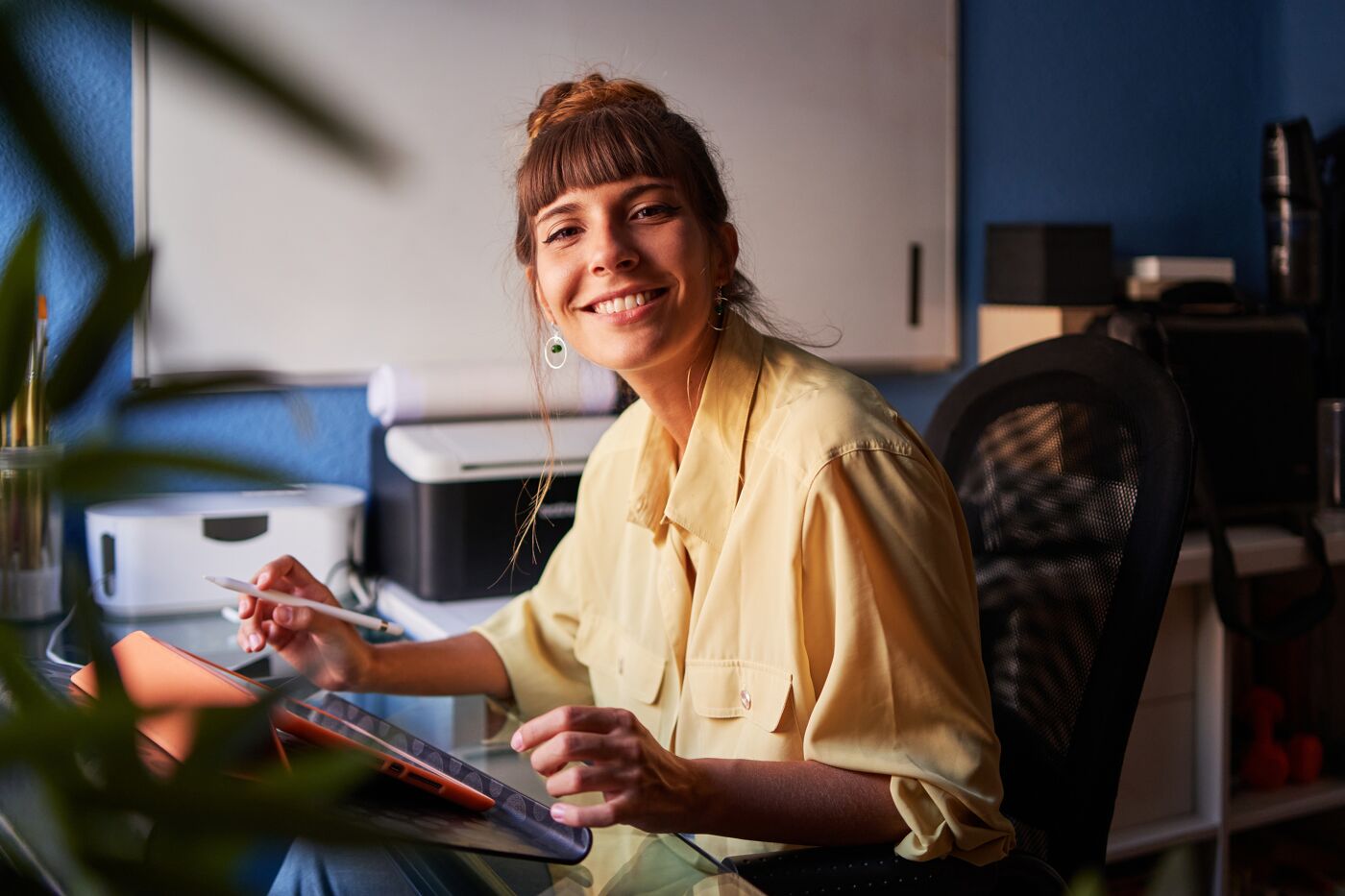 Smiling Woman in Home Office