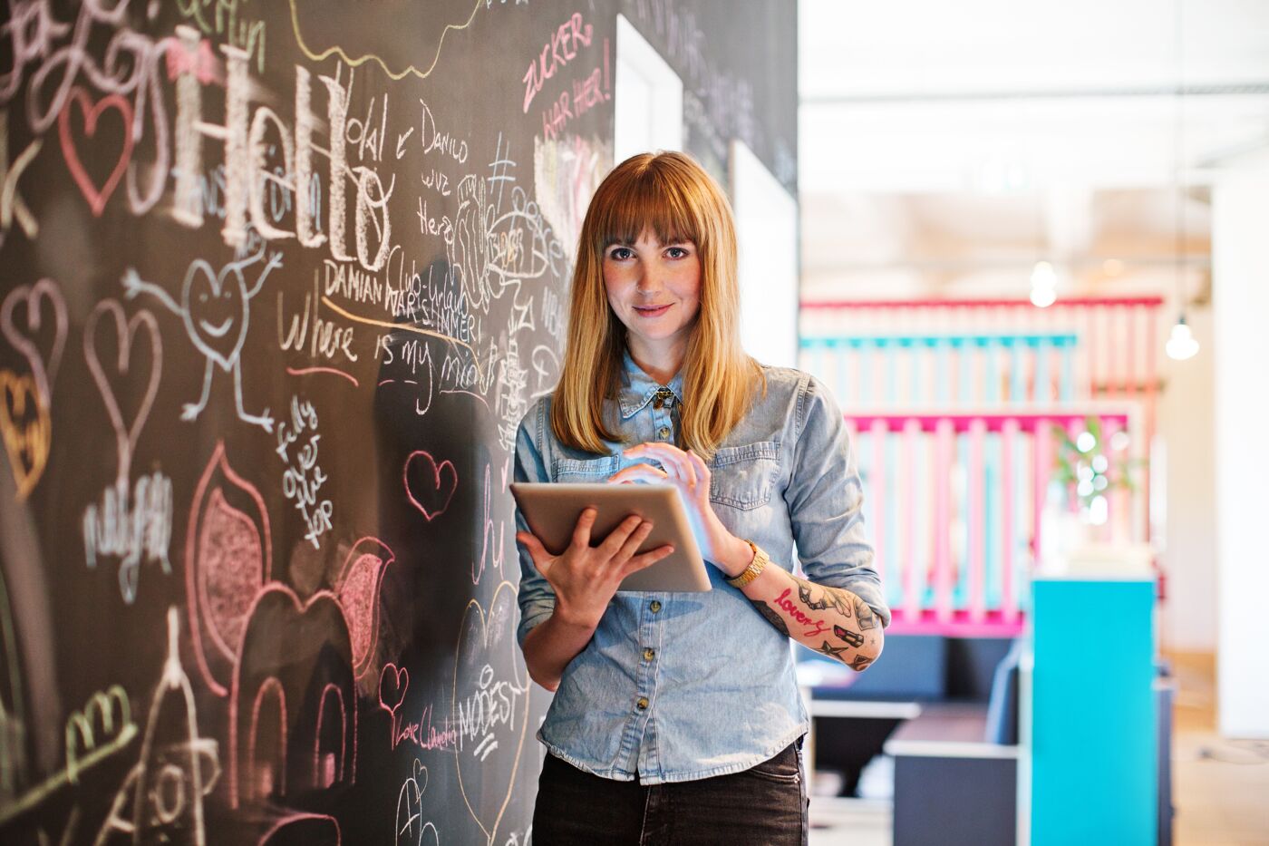 Woman with Tablet in Creative Workspace