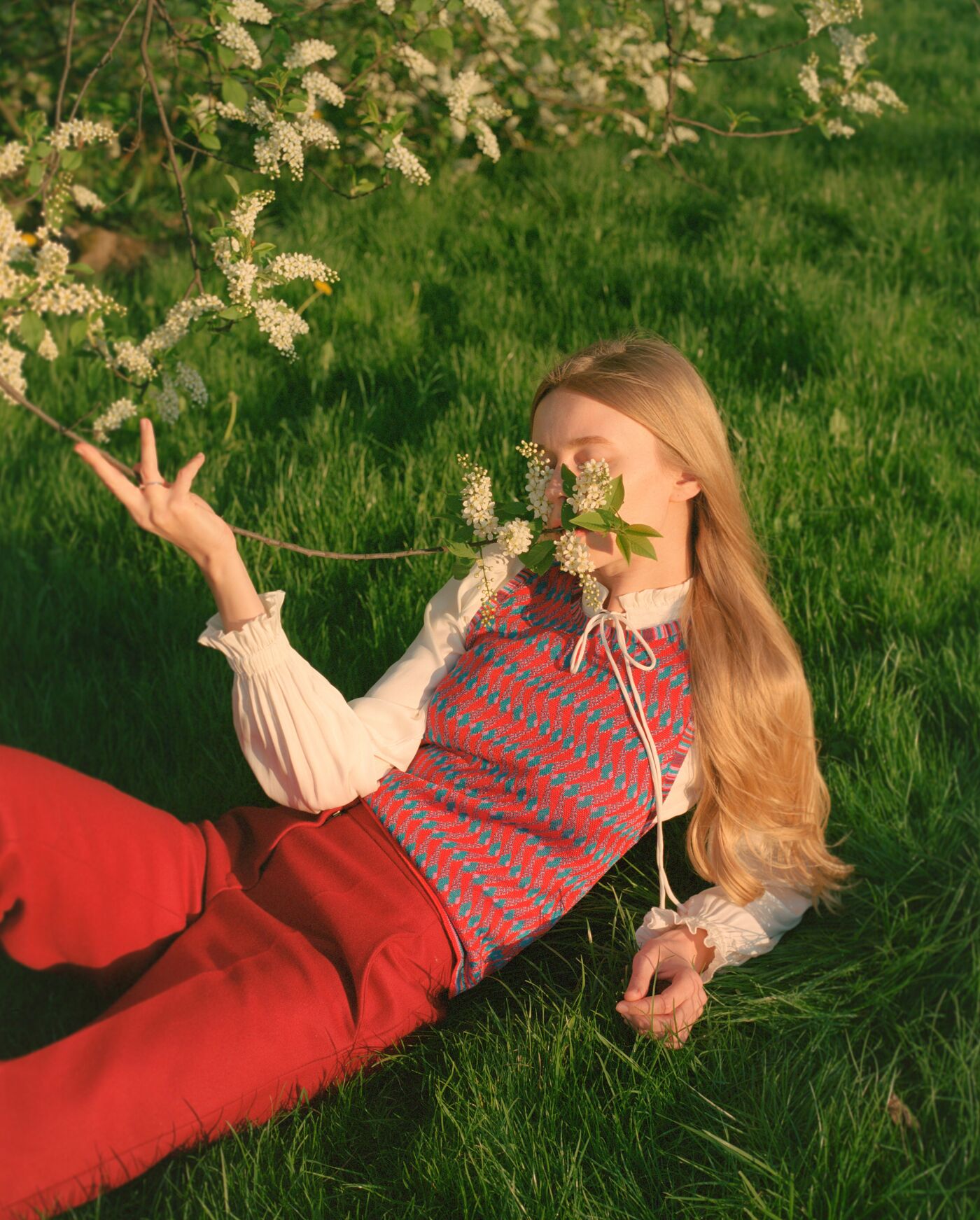 Woman Enjoying Spring Blossoms