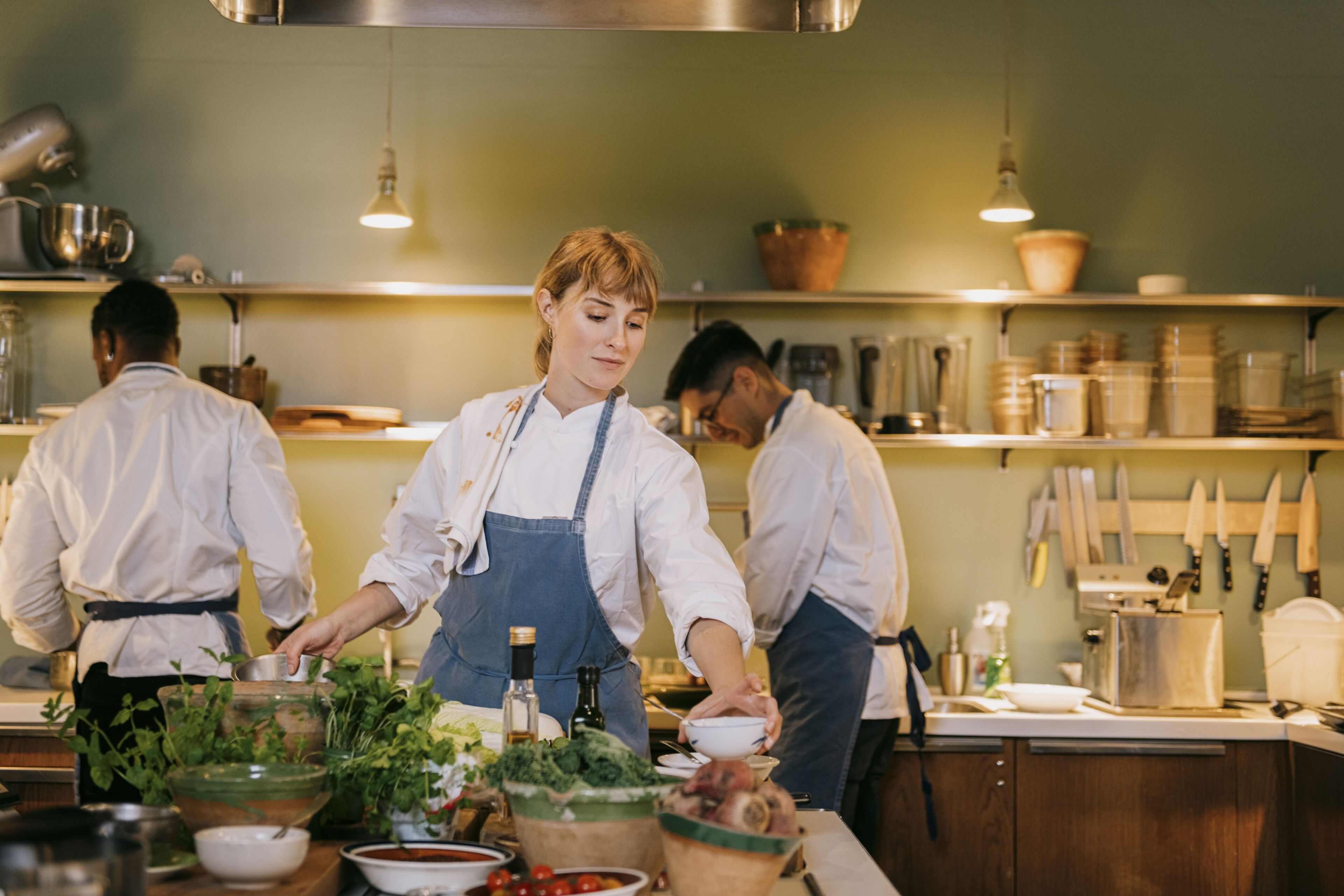 Team of Chefs Preparing Meals in Kitchen