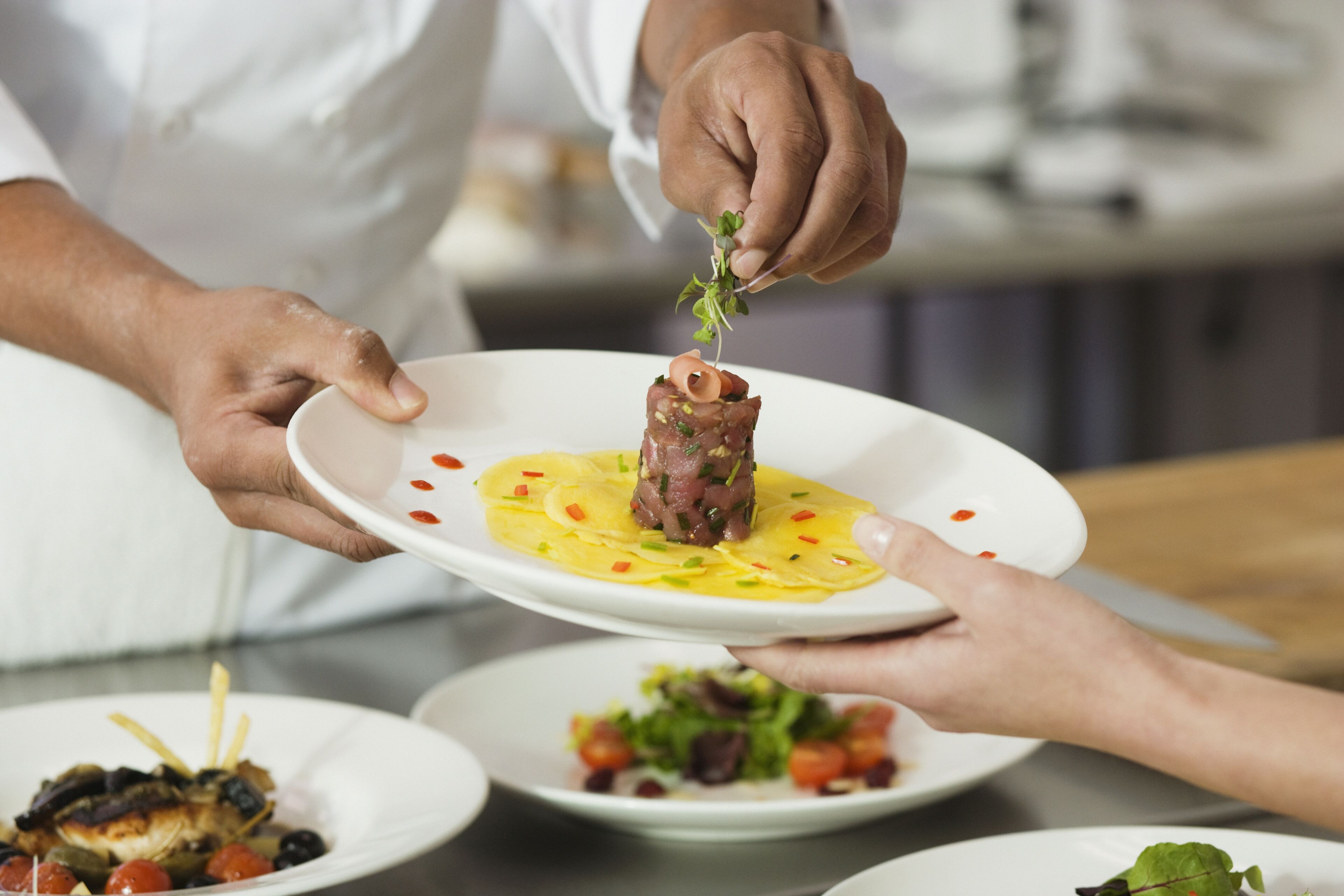 Chef Garnishing a Dish