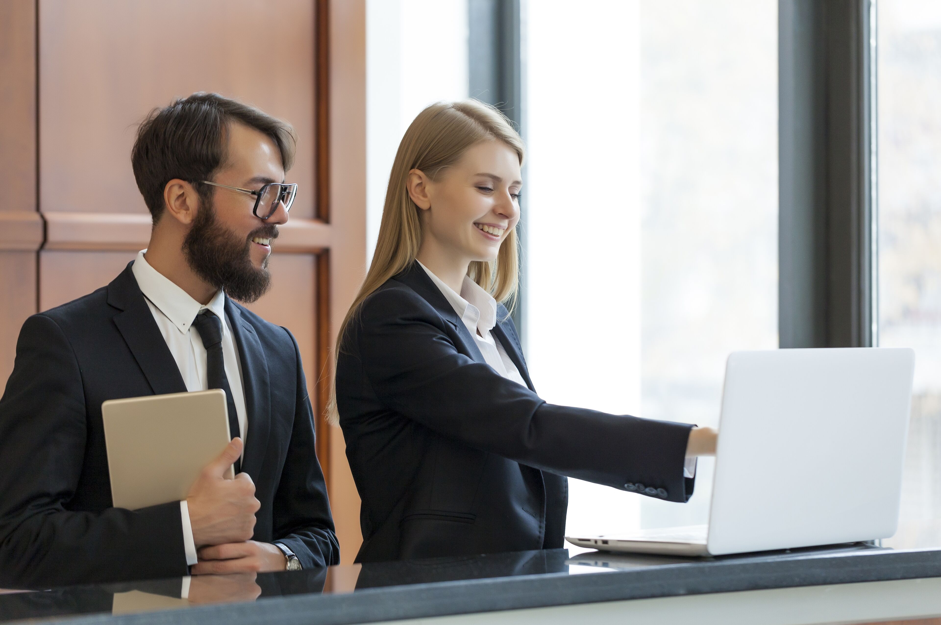 Business Colleagues Working on Laptop