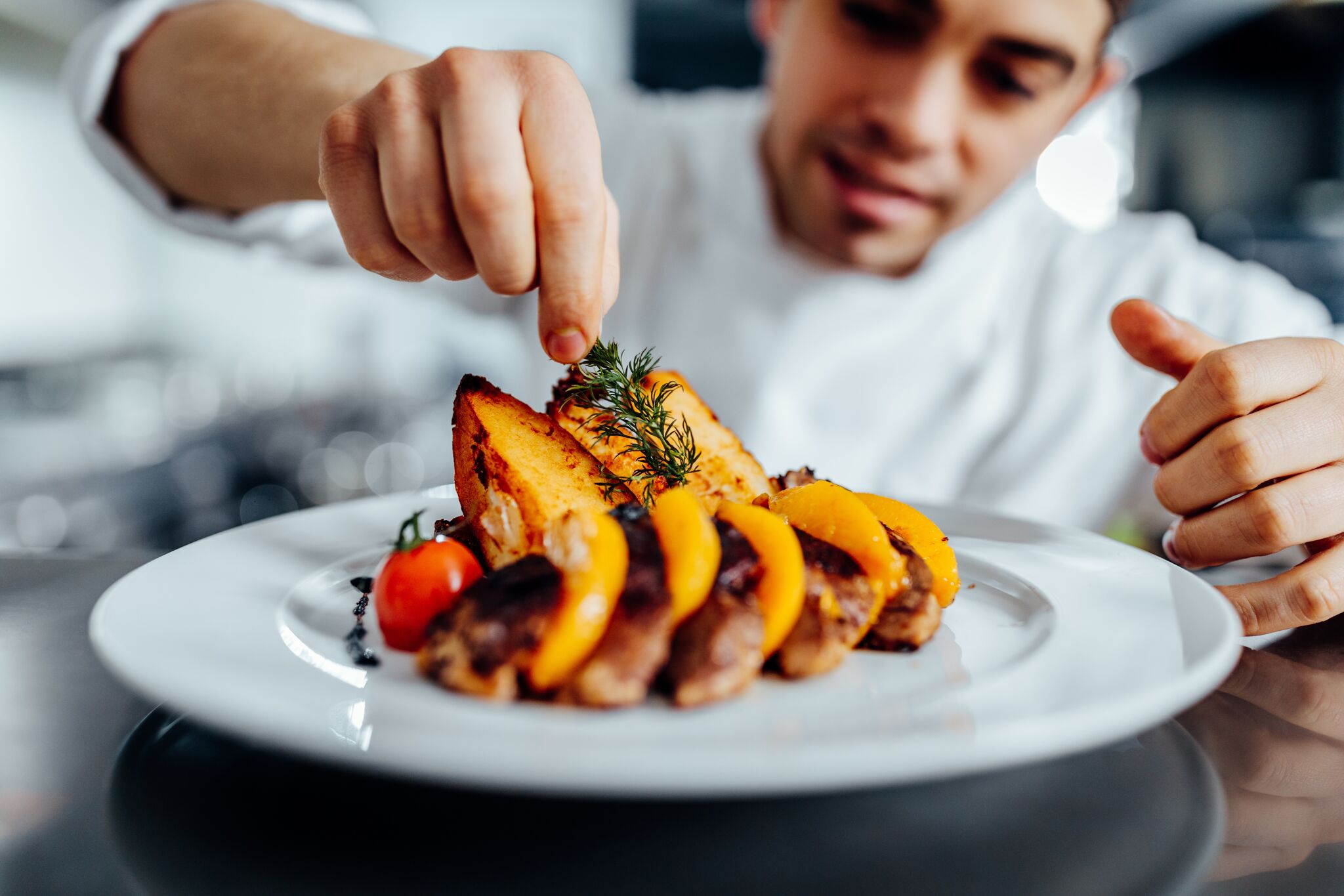 Chef Garnishing a Dish