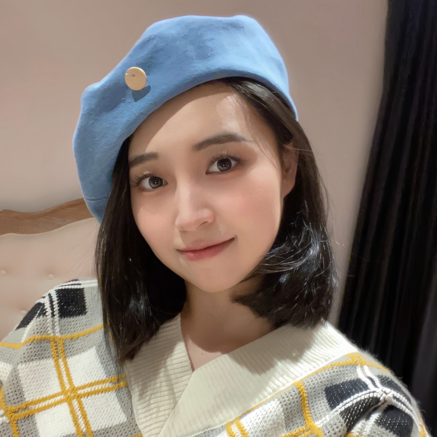 Young Woman Wearing a Blue Beret