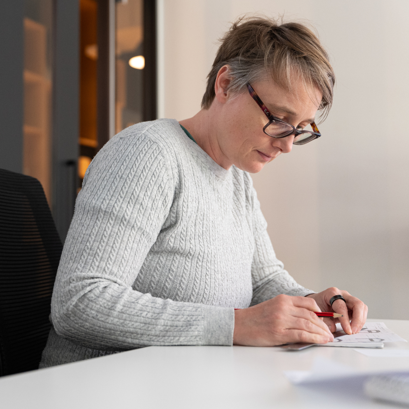 Focused Woman Working on a Design