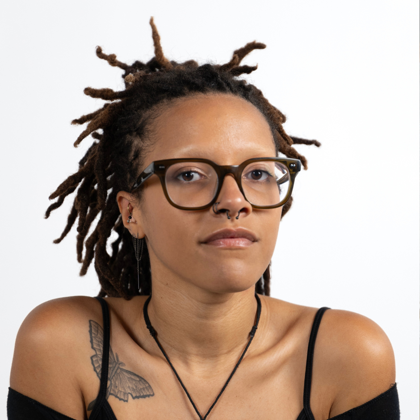 Stylish Woman with Dreadlocks and Glasses