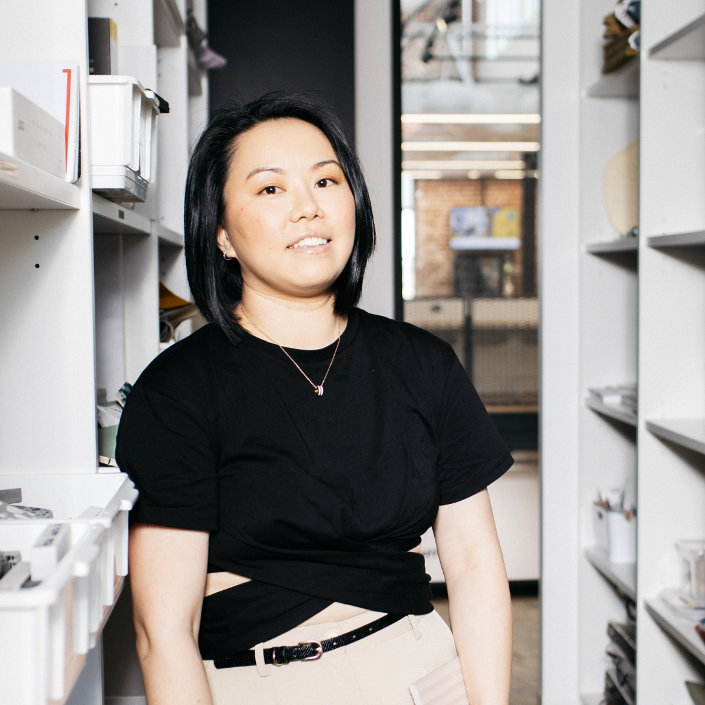 Confident Woman in a Modern Workspace