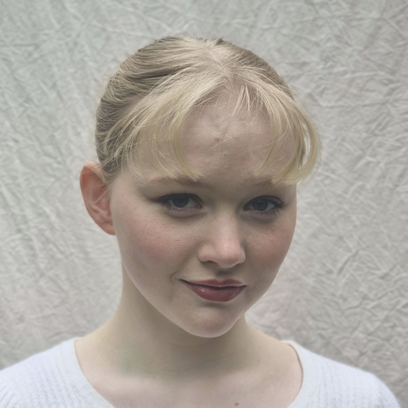 Portrait of a Young Woman with Blonde Hair