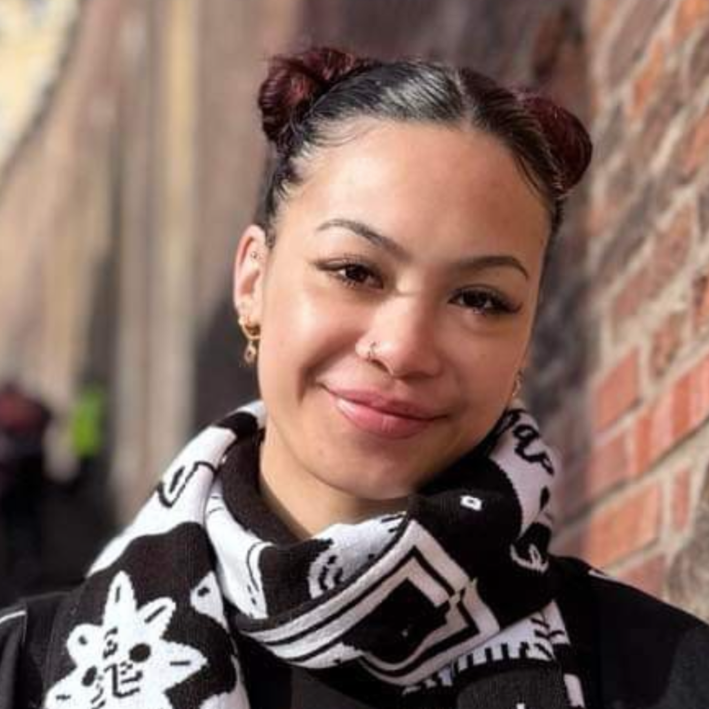 Smiling Young Woman with Styled Hair