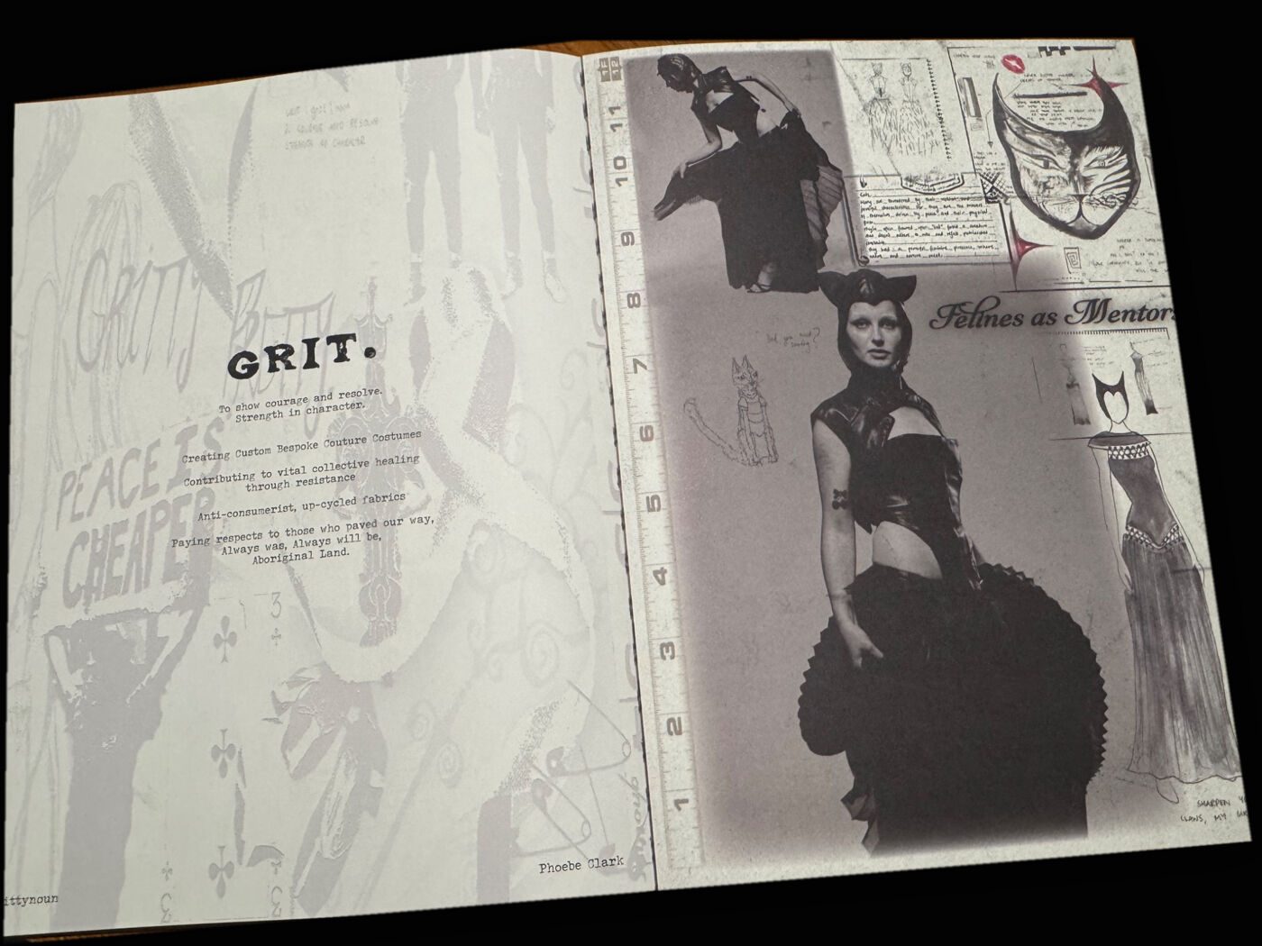 This image displays the open pages of a magazine or book, featuring a collage of fashion photography, sketches, and text. The prominent title "GRIT." is visible on the left page, while the right page showcases a model in avant-garde attire.