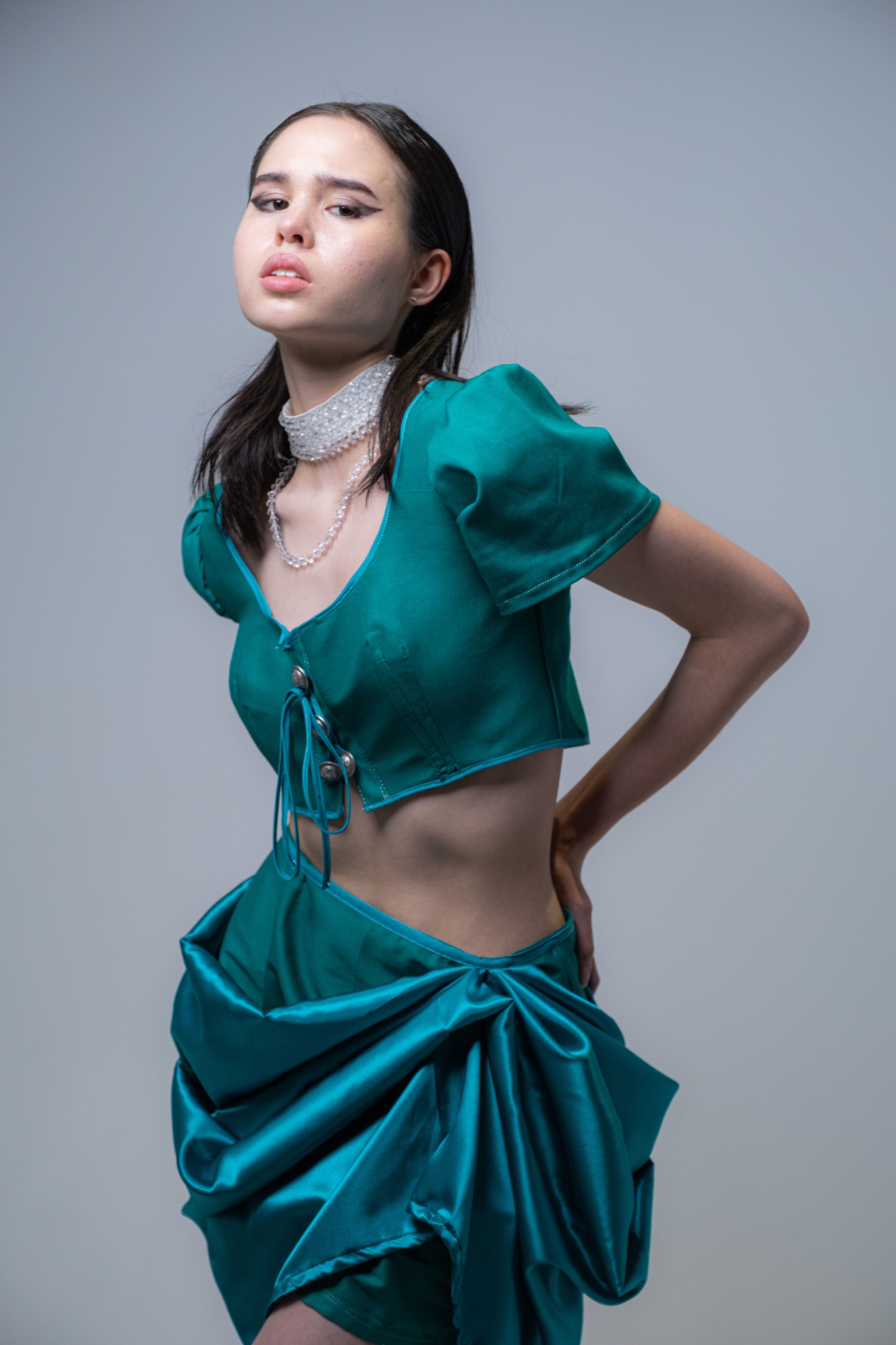 Fashion Model in Teal Outfit