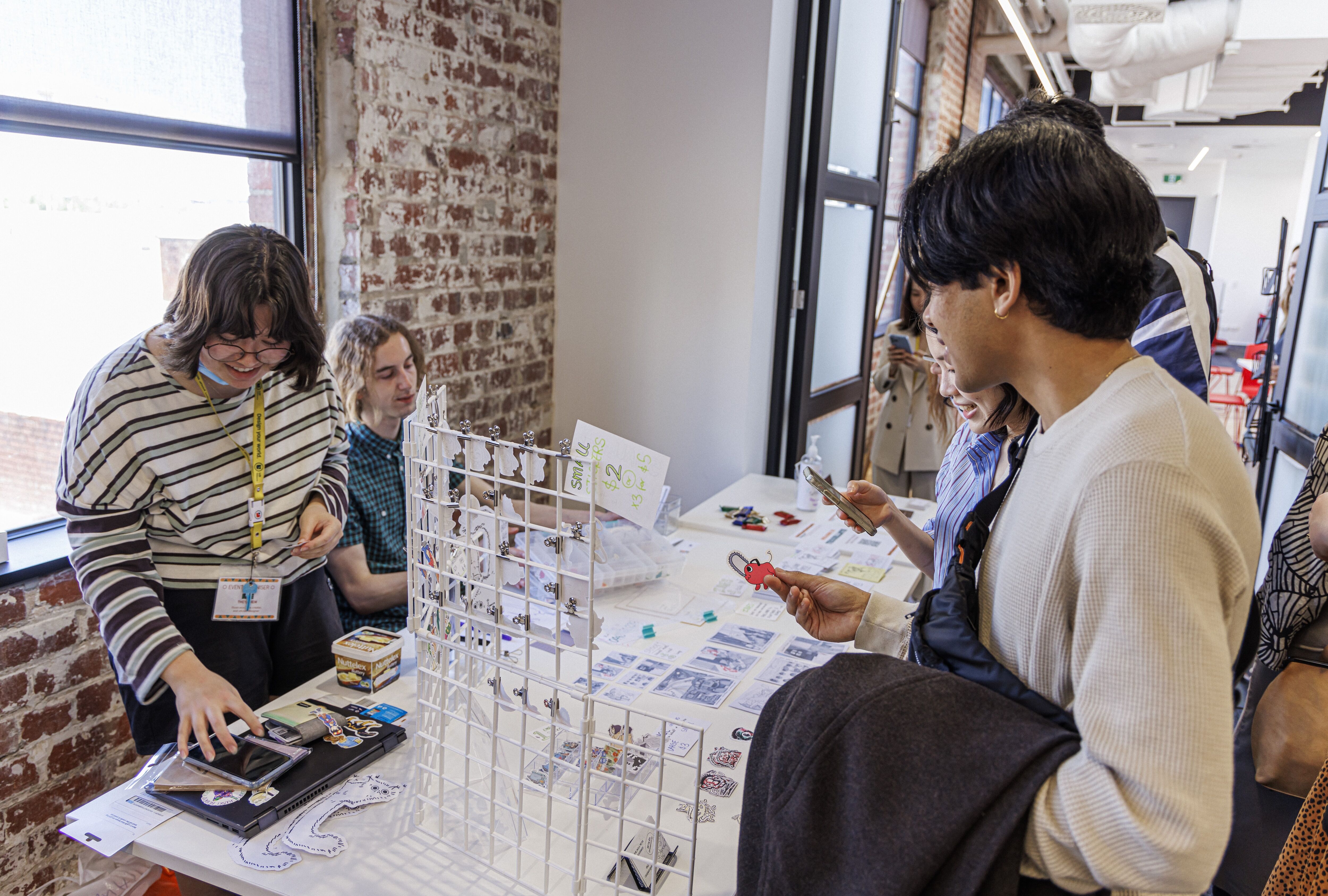 Artists at a Creative Market Stall