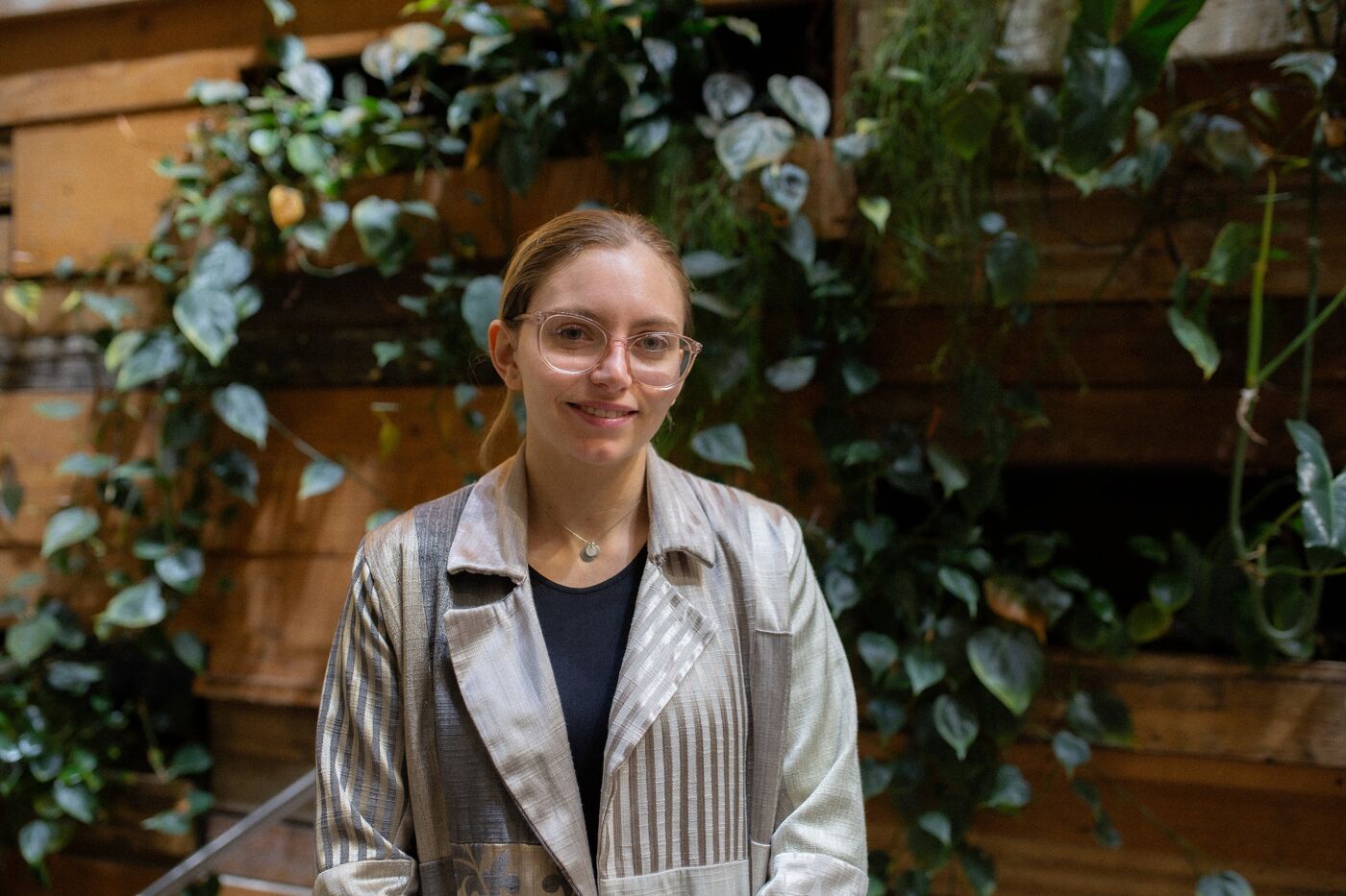 Young Woman in a Greenhouse