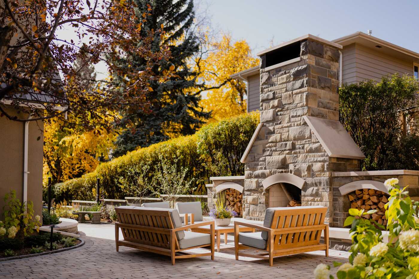 Cozy Outdoor Patio with Stone Fireplace