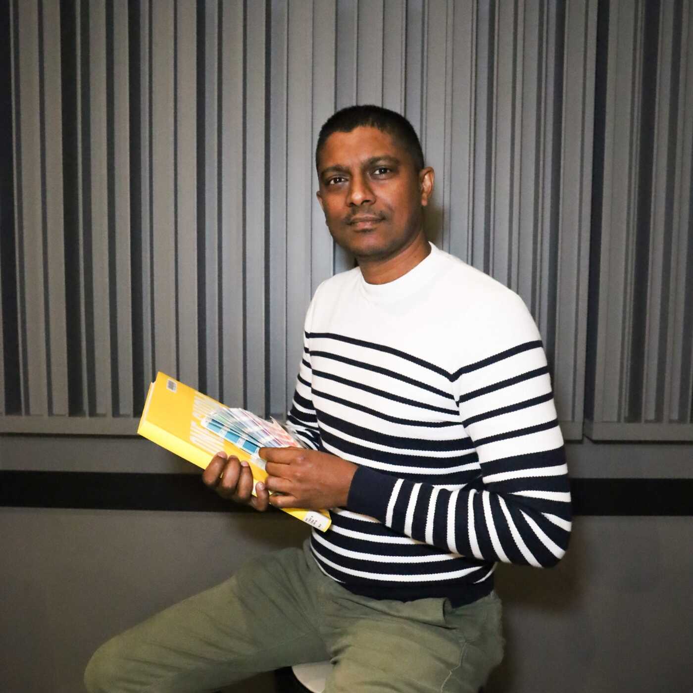 Portrait of a Man Holding a Book
