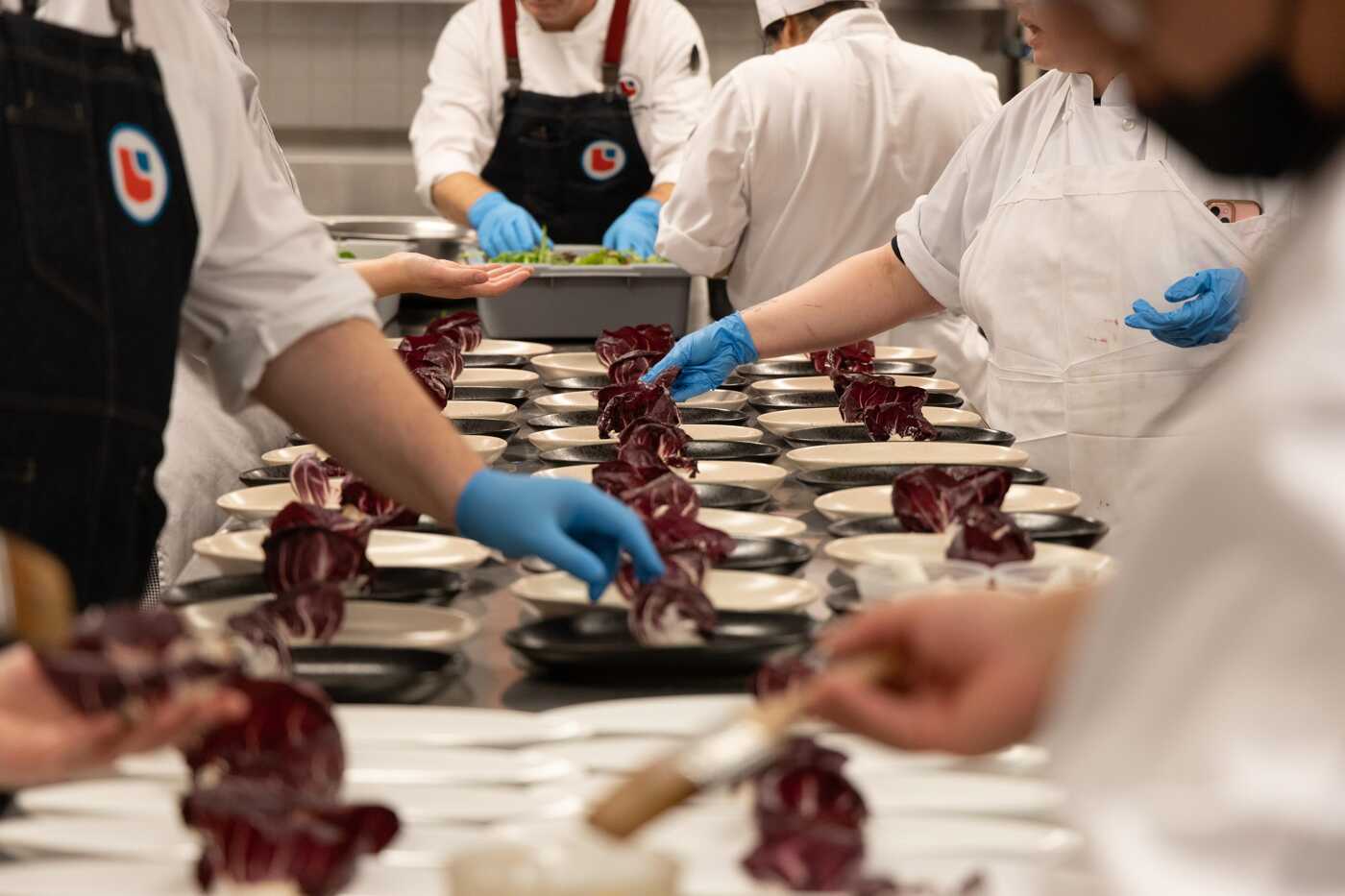 Culinary Team Prepares Plated Dishes