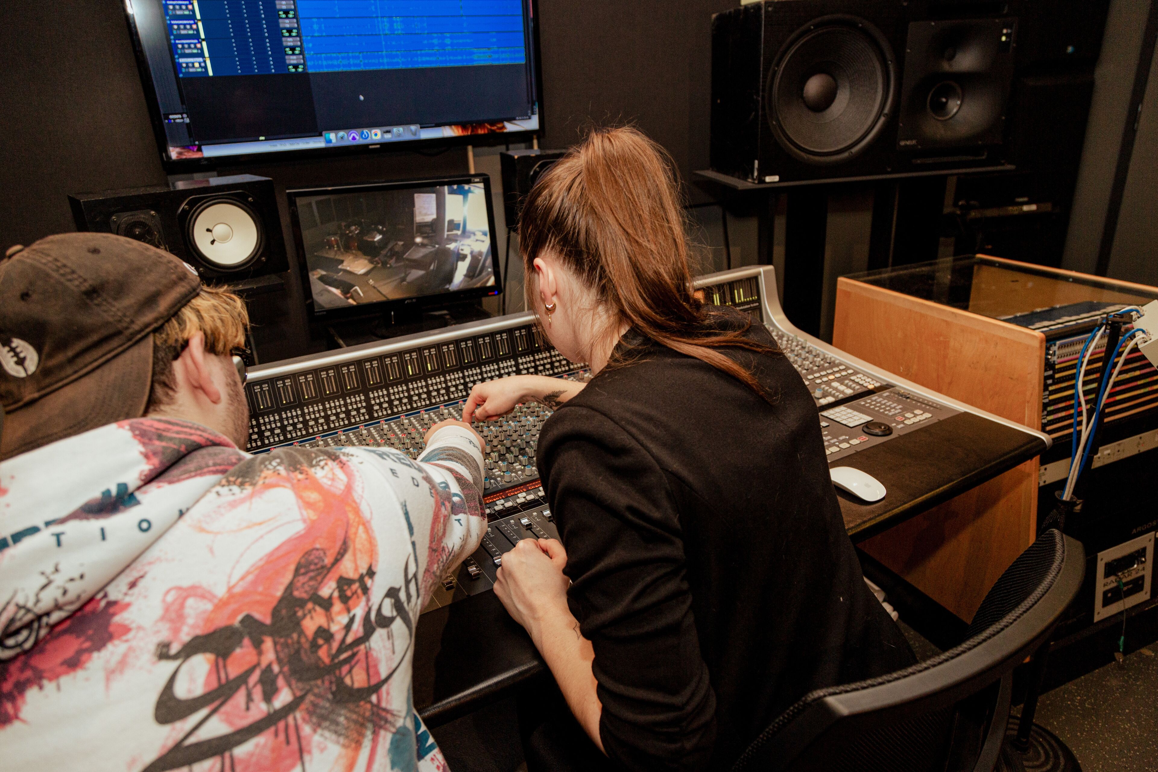 Sound Engineers Working in Studio