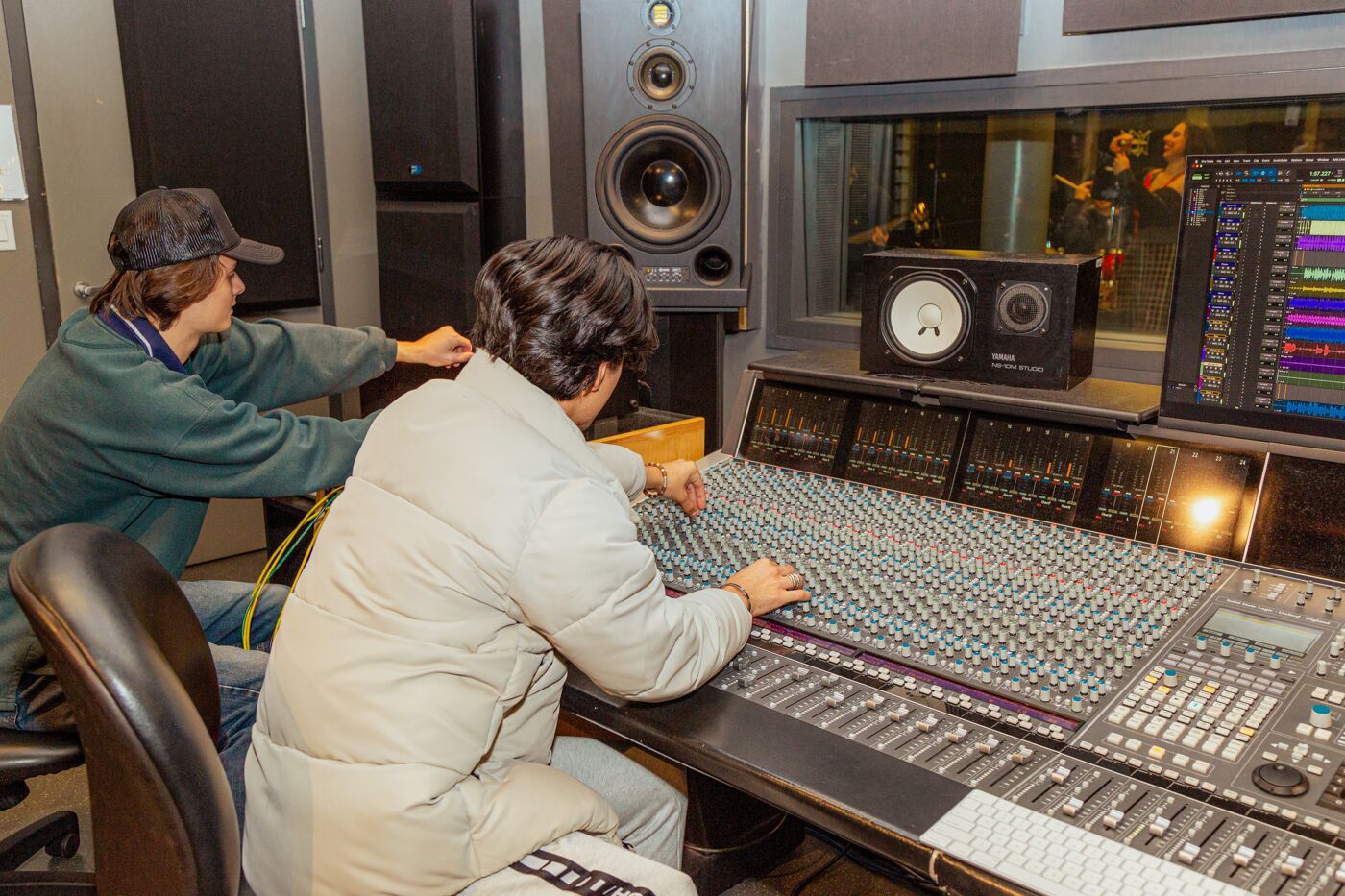 Sound Engineers at Mixing Console