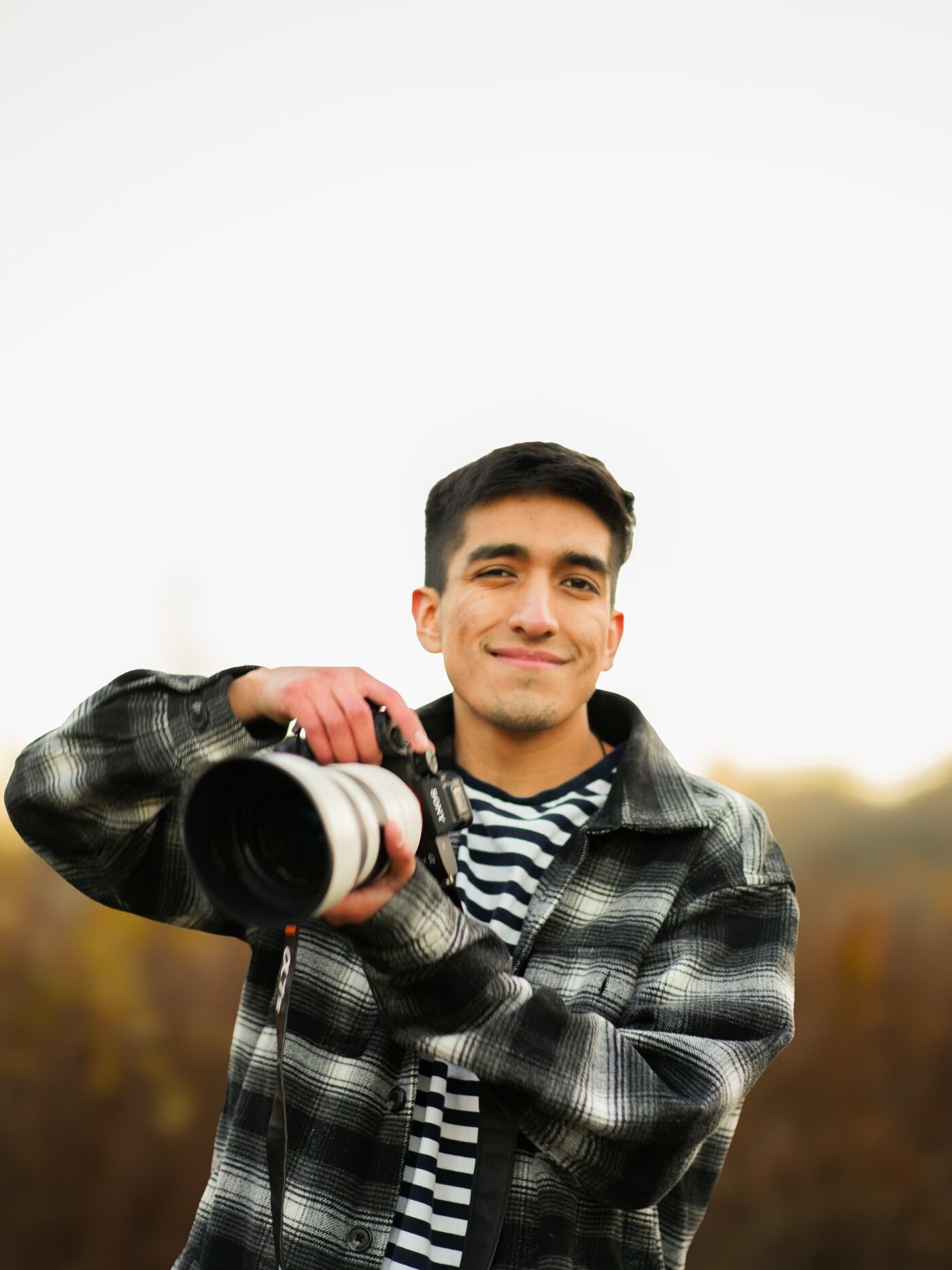 Smiling Photographer Outdoors