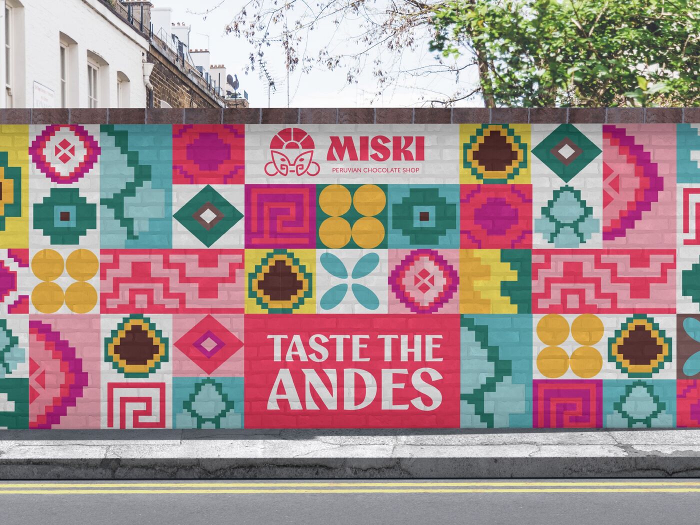 This image shows a colorful mural on a brick wall with the text "MISKI" and "TASTE THE ANDES", suggesting a Peruvian or Andean food and gift shop.