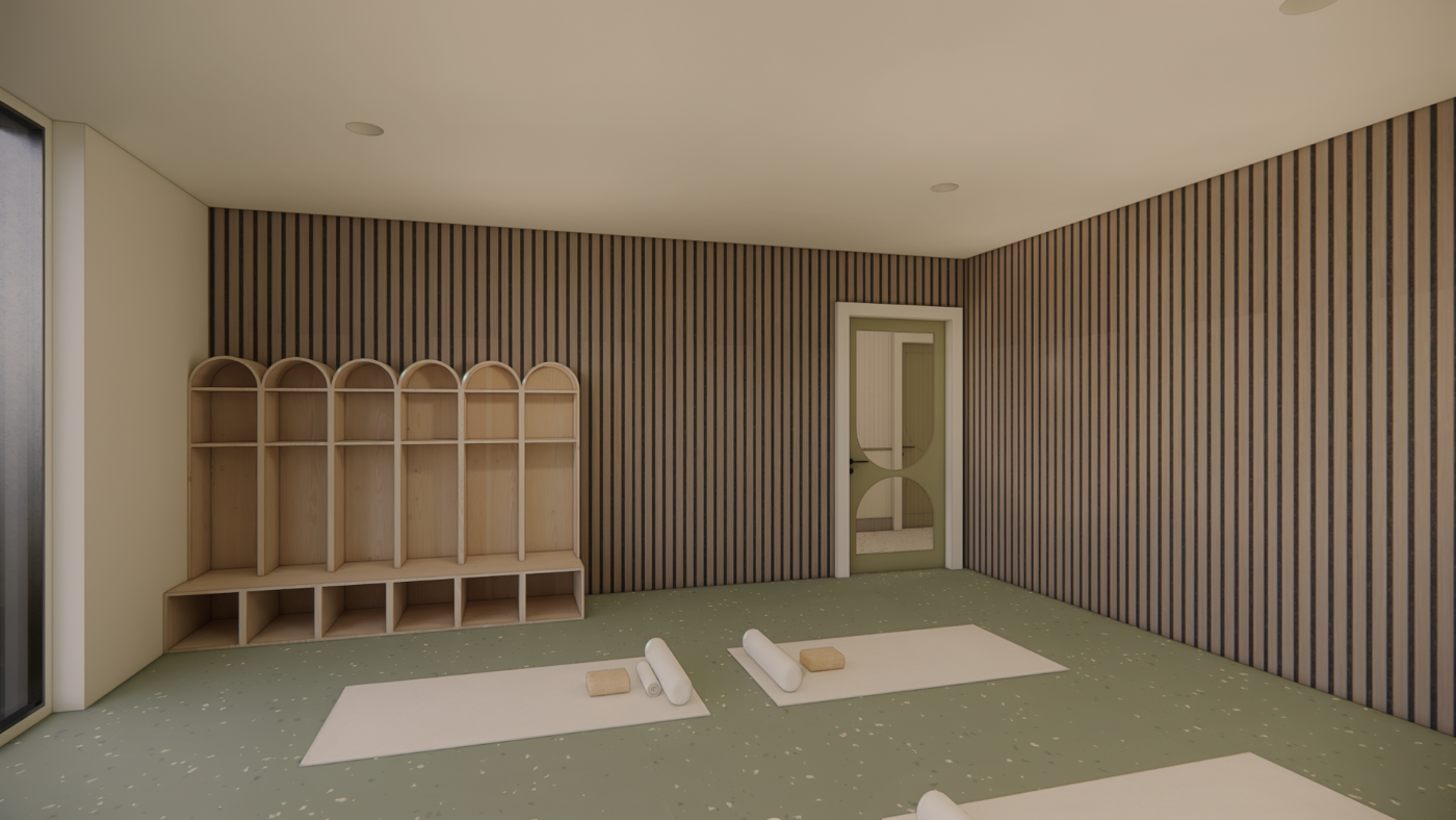 This is a yoga studio featuring yoga mats, bolsters, and blocks, with wooden shelving units against the wall.